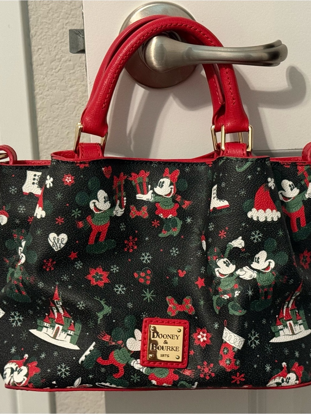 Dooney & Bourke Black Satchel with Red Trim and Holiday Disney Print